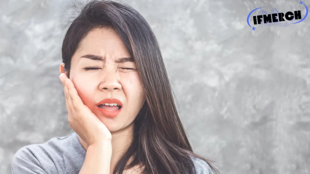 "Can gum disease kill you? Woman experiencing gum pain, highlighting the serious impact of gum disease."