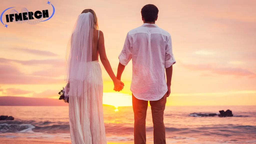 Couple holding hands at sunset on the beach. Can You Get Invited to a Wedding?